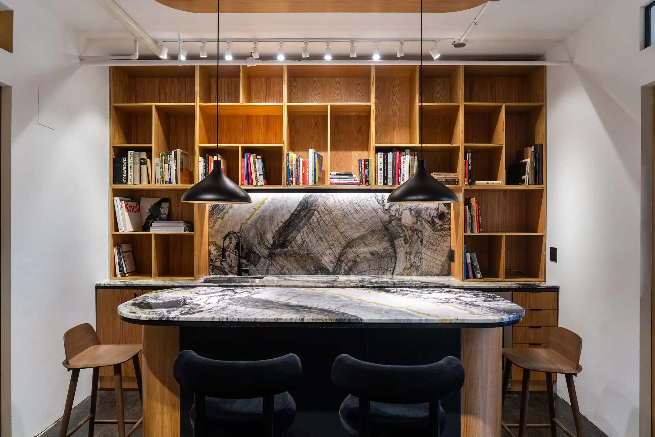Wide view of the KZ_K Studio library bar and shelving