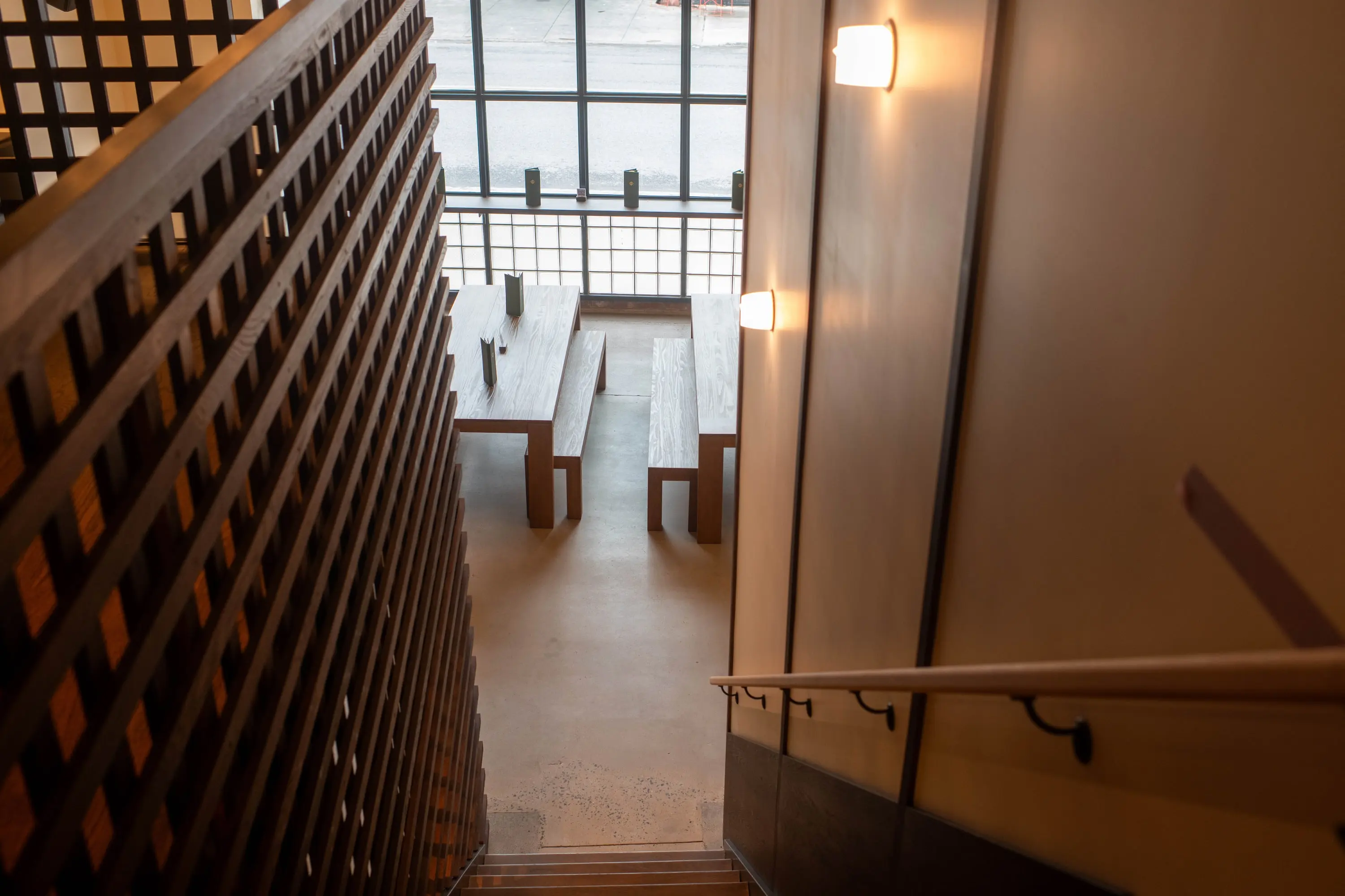 Timber lattice screen wrapping the stair at Eckhart Beer Co