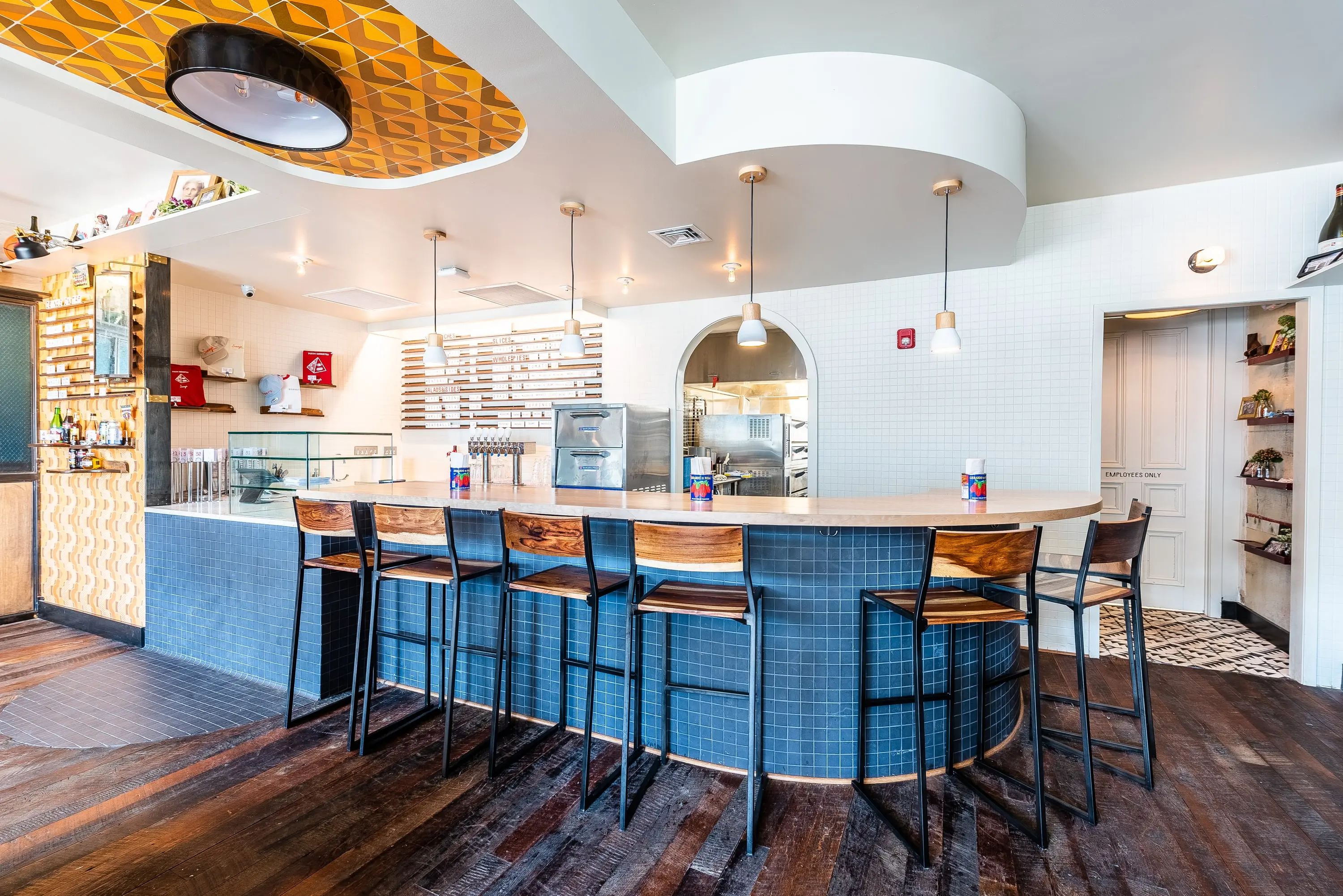 Tiled counter and open kitchen at Sonny's Pizza