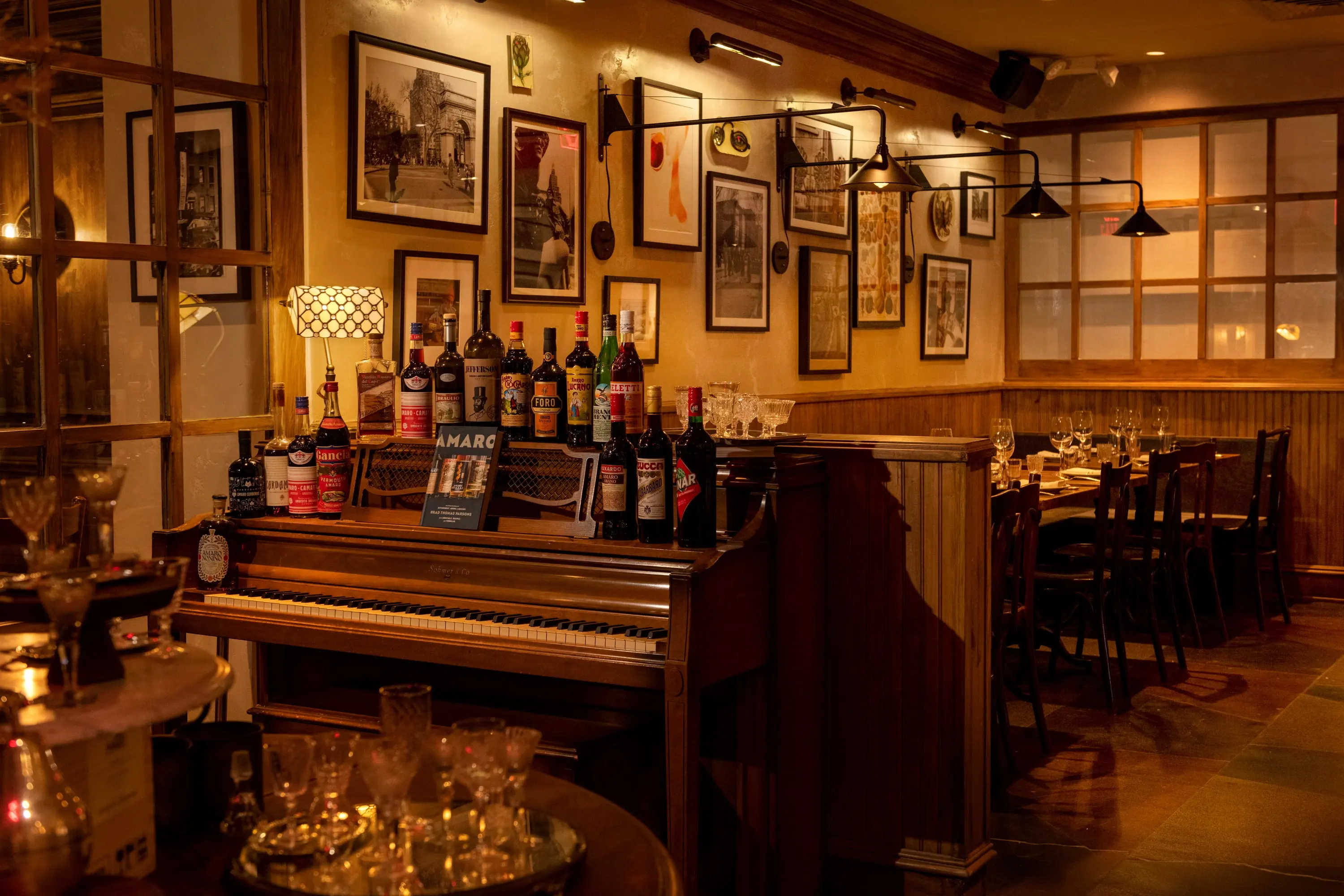 Upright piano in the corner of One Fifth beside the bar
