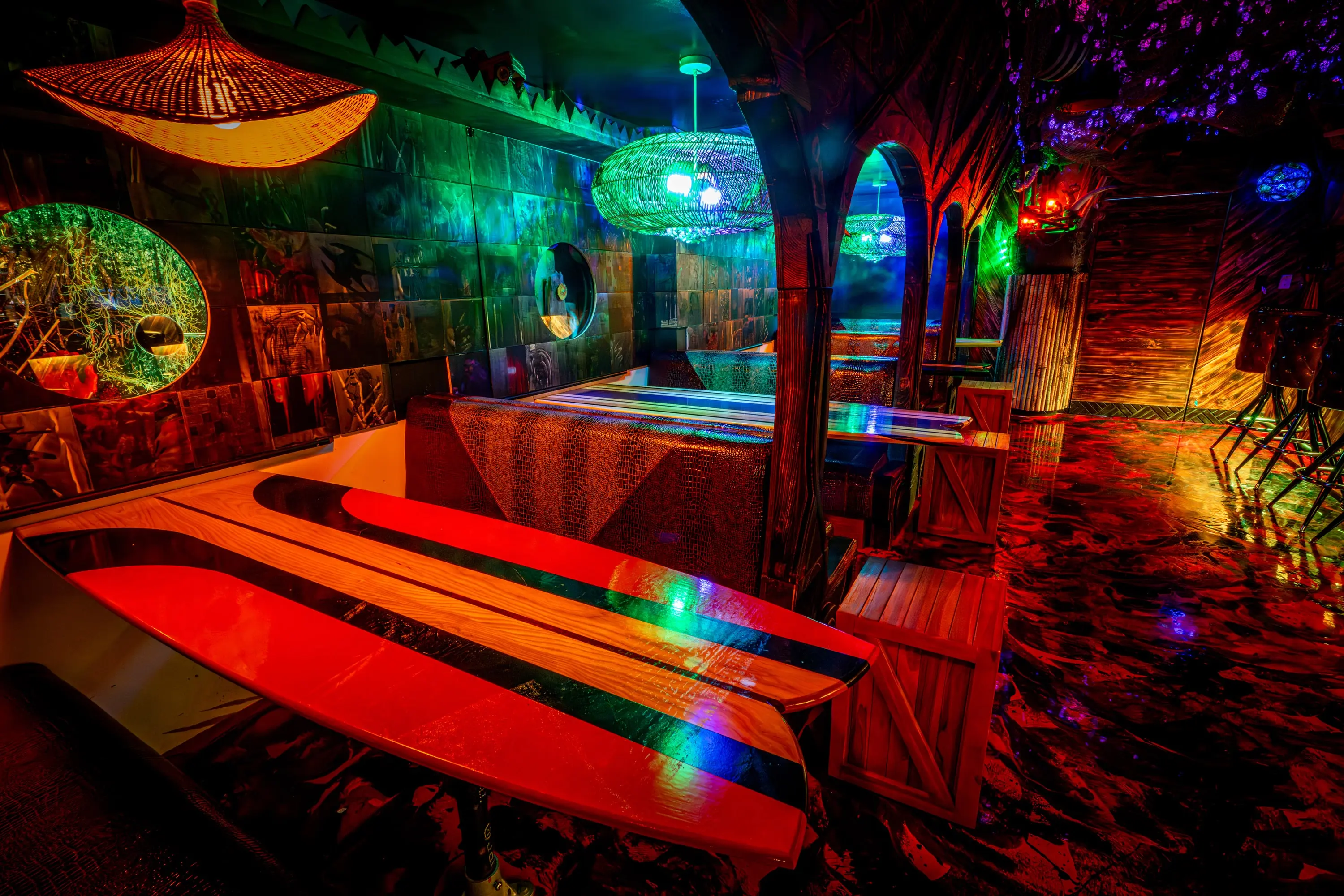 Custom table with an illuminated lava-flow inlay at Paradise Lost