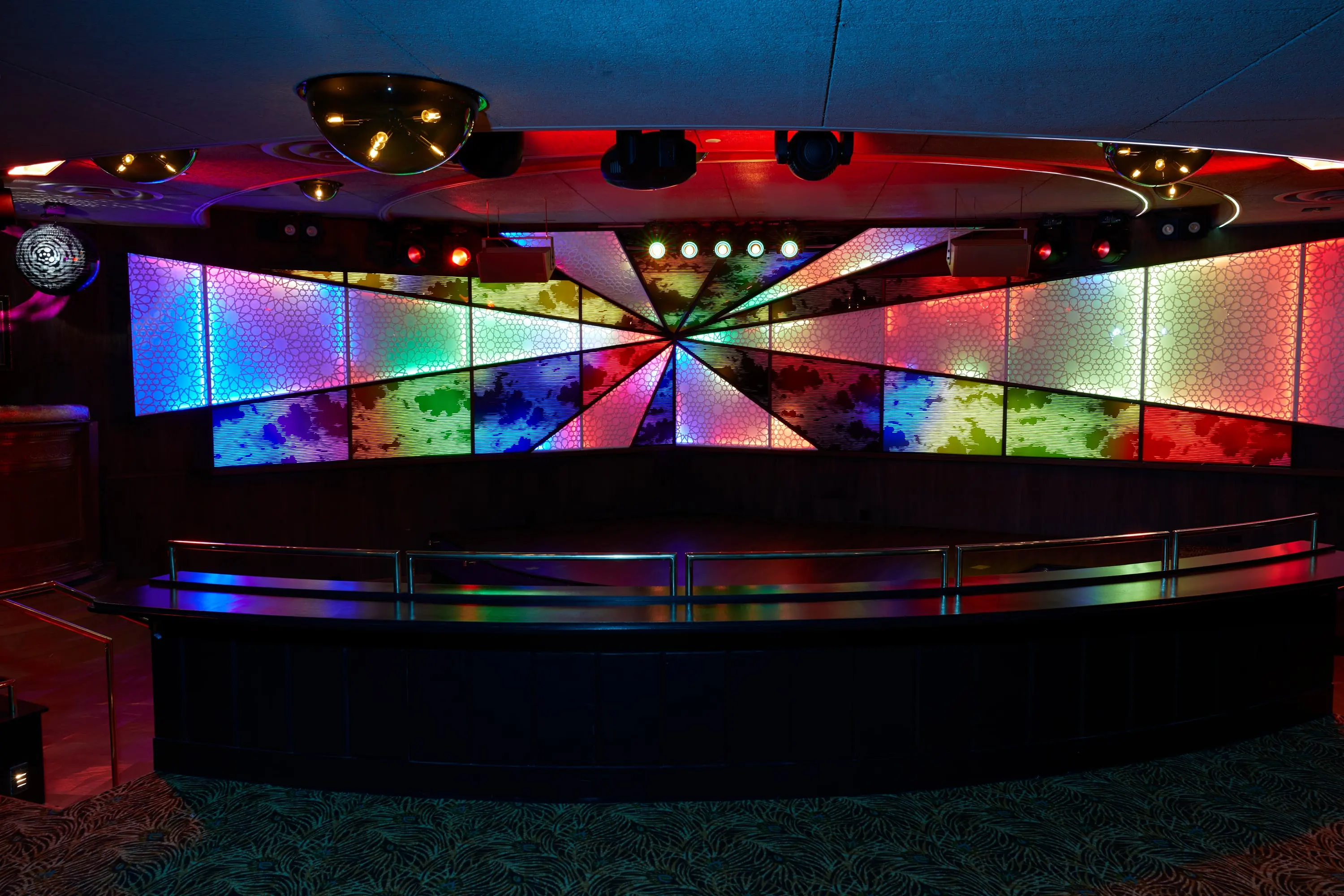Wide view of The Sultan Room stage and LED wall from the floor