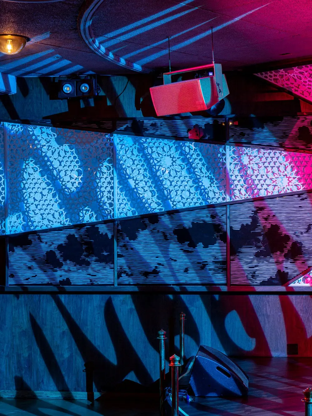 Stage lighting rig and LED panels at The Sultan Room